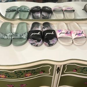 Three pairs of pink slides size LARGE